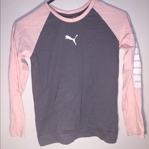 A pink and grey puma long sleeve shirt